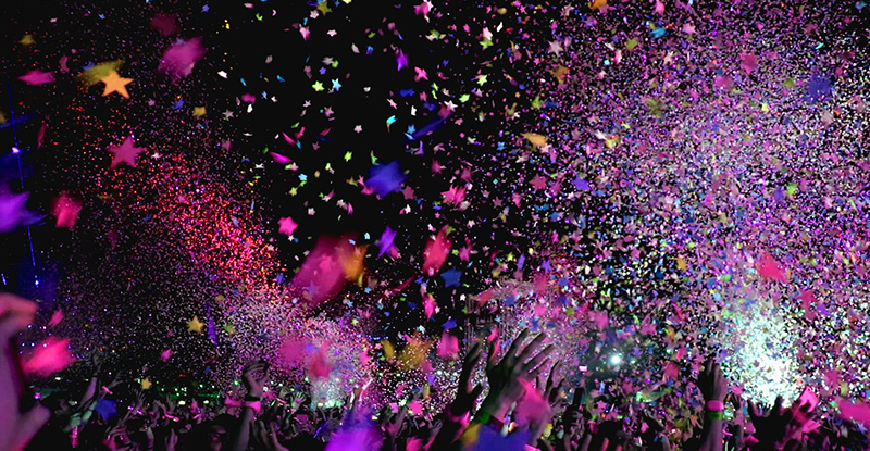 Congratulations to the Successful 2020 CFE Writers A photo with people gathered and throwing confetti and glowing stars in the air.
