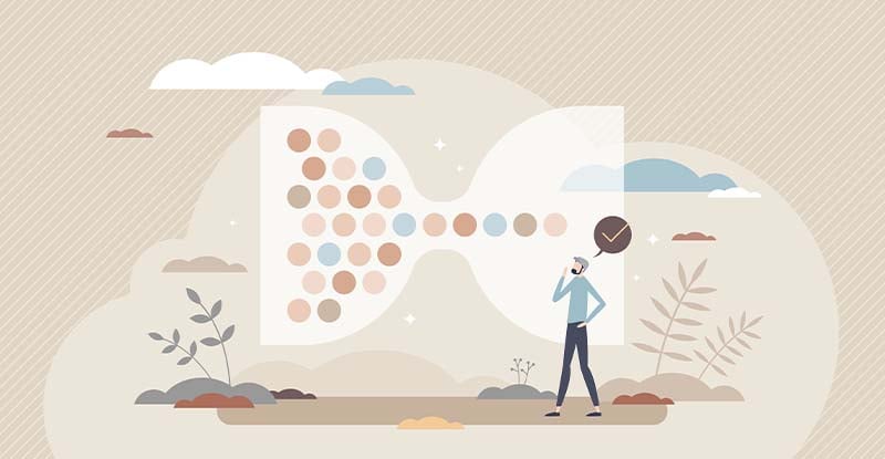 Effective Elective Planning: Part 2 An illustration of a horizontally placed hourglass with balls flowing from one end to another, while a man stands nearby, looking at it thoughtfully.