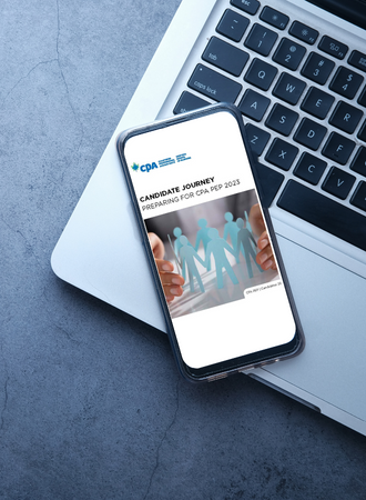Image A phone placed on the laptop keyboard, with the screen displaying the CPA PEP Candidate Guide 2023.